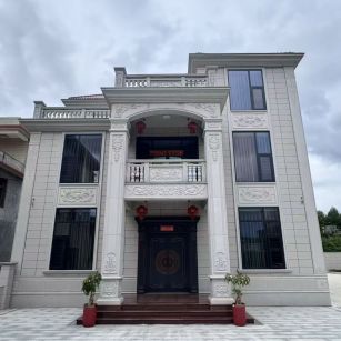 青海 芝麻白石材别墅干挂案例展示